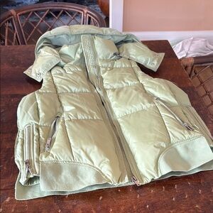 Tribal Green Puffer Vest removable hood.